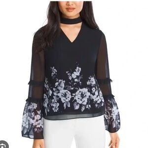 White House Black Market floral blouse with flare sleeves Size 4